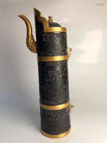 A GILT-DECORATED BLACK-GLAZED TIBETAN-STYLE EWER AND