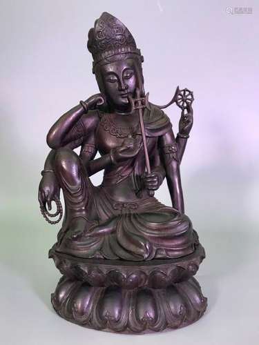 A CARVED ZITAN GUANYIN.ANTIQUE