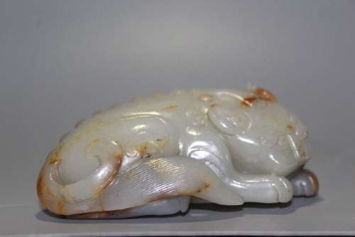 A CARVED WHITE JADE BEAST.QING DYNASTY