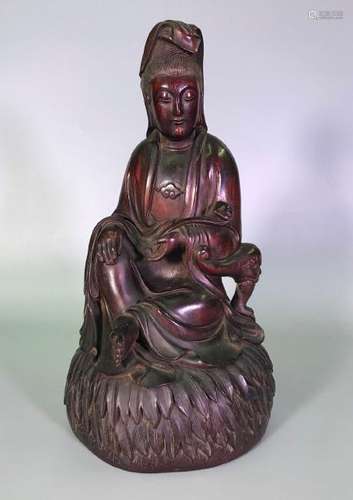 A CARVED ZITAN GUANYIN.ANTIQUE