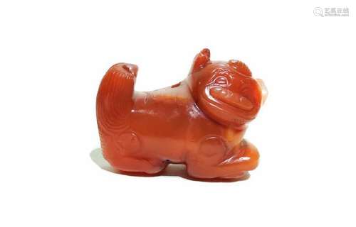 A CARVED RED-AGATE BEAST.ANTIQUE