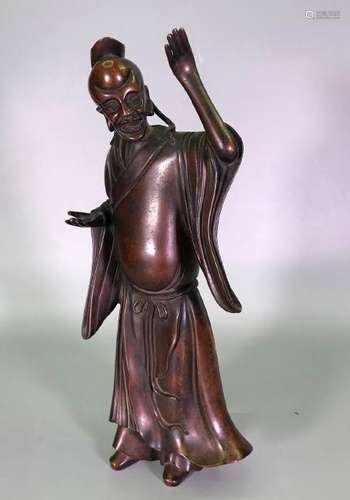 A CARVED BRONZE FIGURE.ANTIQUE