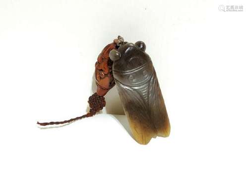 A CARVED JADE CICADA. ANTIQUE