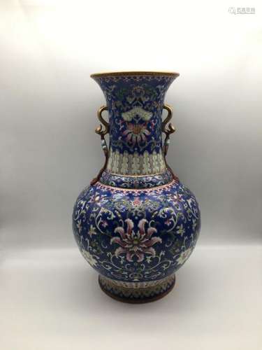 A BLUE-GROUND FAMILLE-ROSE VASE.MARK OF QIANLONG