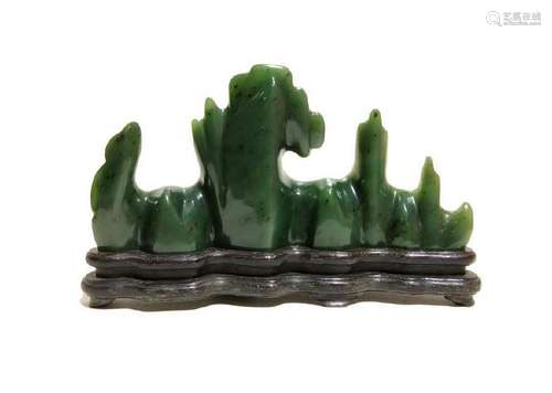 A CARVED SPINACH-JADE PENREST.ANTIQUE