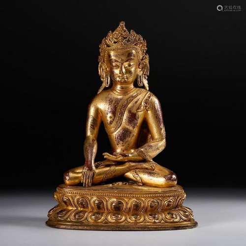 A GILT-BRONZE FIGURE OF BUDDHA.QING DYNASTY