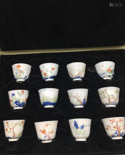 A SET OF TWELVE DOUCAI CUPS. MARK OF KANGXI