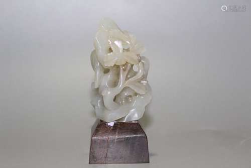 A CARVED WHITE JADE BOULDER.ANTIQUE