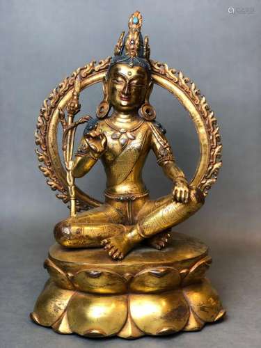 A GILT-BRONZE FIGURE OF GUANYIN.MING DYNASTY