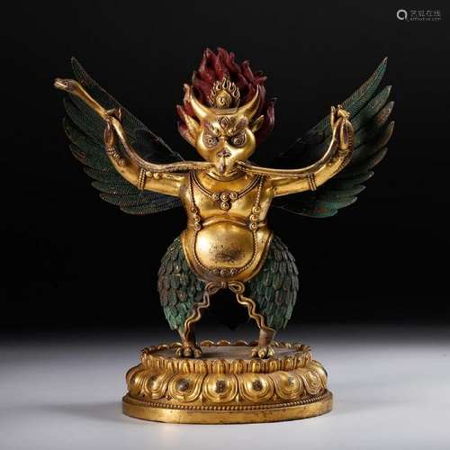 A GILT-BRONZE FIGURE OF DAPENG GARUDA.MING DYNASTY