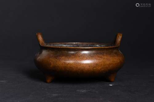 A BRONZE TRIPOD CENSER