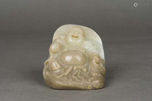 A WHITE JADE CARVING OF BUDDHA