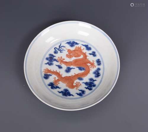 A BLUE AND WHITE AND IRON RED 'DRAGON' DISH