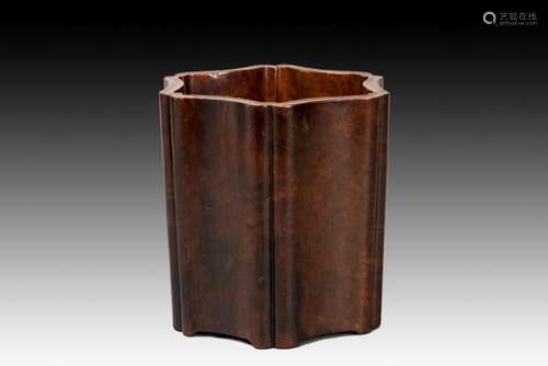 A WOODEN BRUSH POT