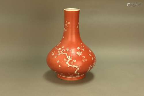 A CHINESE FAMILLE ROSE CORAL GROUND PRUNE VASE