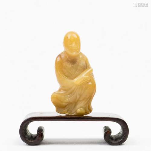 A SHOUSHAN FIGURINE WITH BASE