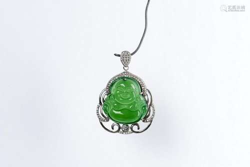 A BUDDHA JADEITE AND DIAMOND PENDANT