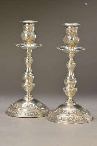 A pair of candlesticks, Adam Manns & son