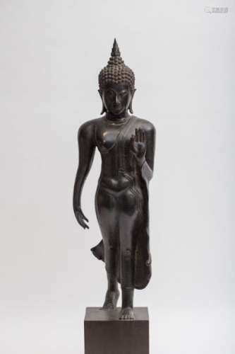 Buddha walking \nBronze, on a pedestal. Siam, antiq…