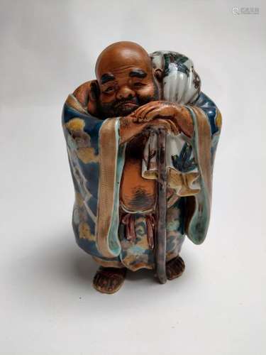 The Immortal Tieguai Li \nPolychrome porcelain stat…