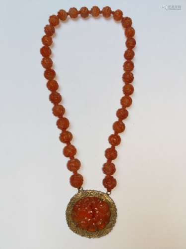 Carnelian necklace \nComposed of 34 carved carnelia…