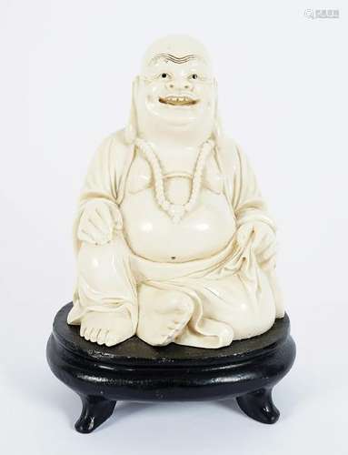 FIGURE OF A SEATED BUDDHA