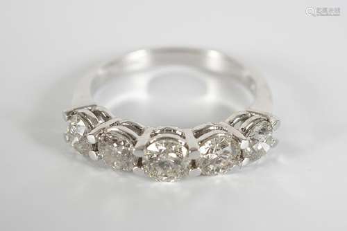 18 CT. WHITE GOLD HALF ETERNITY RING