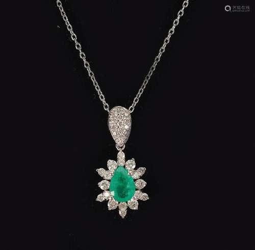 18 CT. WHITE GOLD EMERALD AND DIAMOND  PENDANT