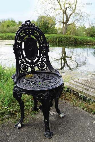 PAIR OF CAST IRON CAMEO BACK CHAIRS