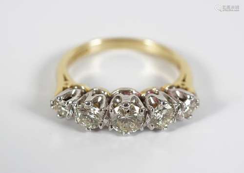 18CT YELLOW GOLD GRADUATED DIAMOND RING