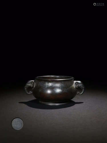 A COPPER CENSER WITH ELEPHANT SHAPED EAR
