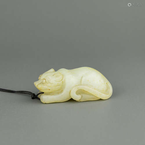 A Chinese Carved Jade Foo-Dog