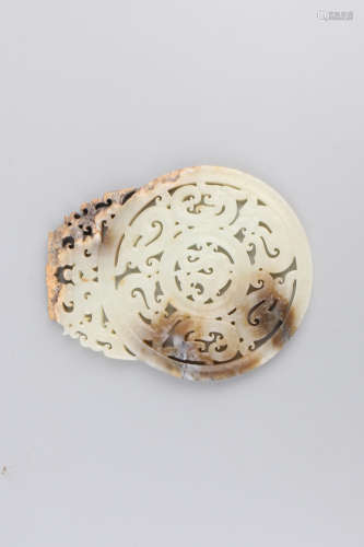 A Chinese Carved Round Jade Pendant