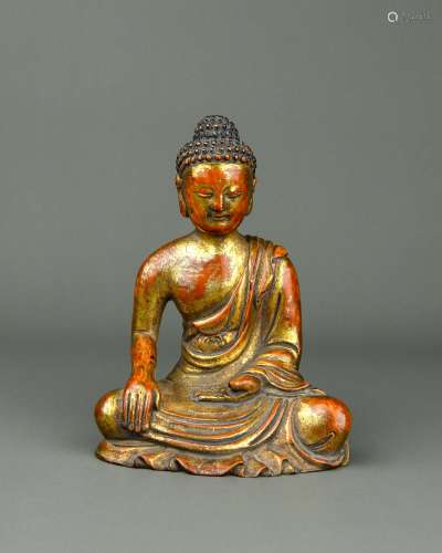 A Chinese Carved Gilt Wood Buddha