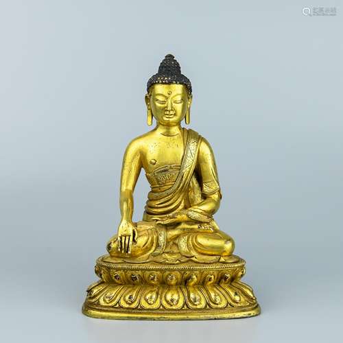 A Chinese Gilt Bronze Buddha