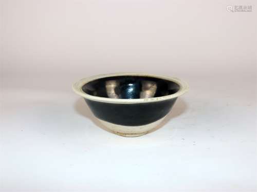A Chinese Black Glazed Porcelain Tea Cup