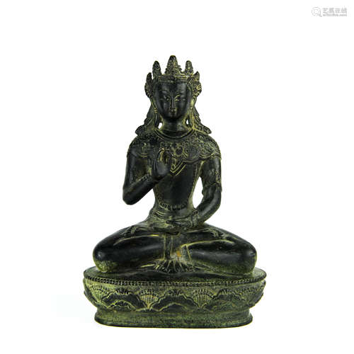 A Chinese Carved Bronze Buddha