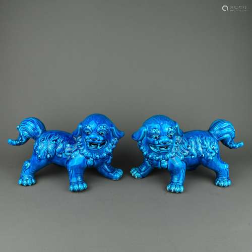 Two Chinese Blue Glazed Porcelain Lions