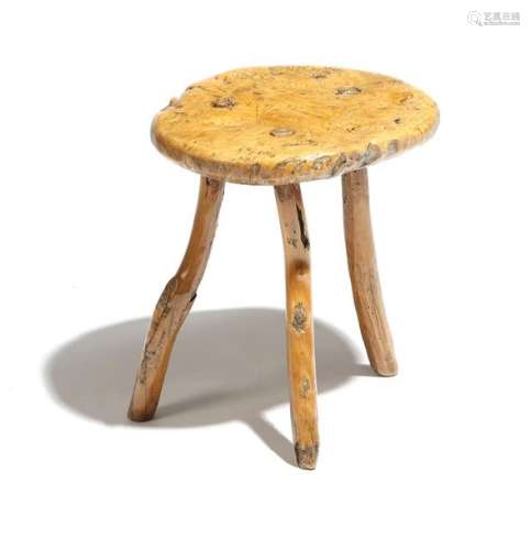 A 19th century primitive ash dairy stool, the burr…