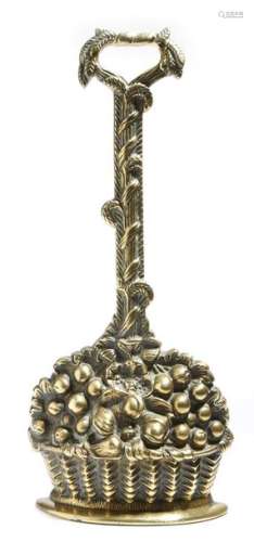 A Victorian brass doorstop, in the form of a baske…