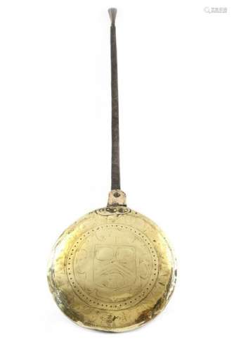 A Charles II brass warming pan, with an iron handl…