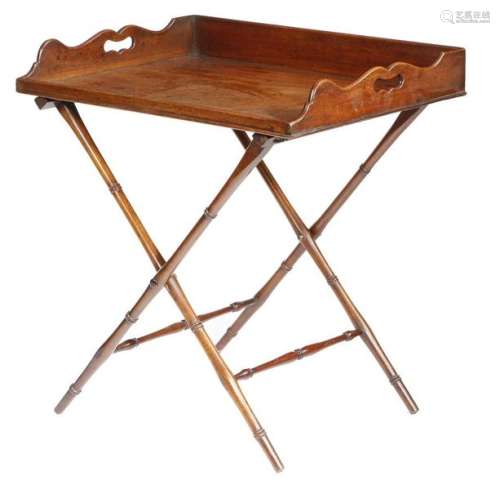 A George III mahogany butler's tray, the three qua…