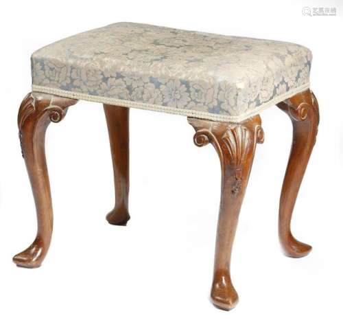A walnut stool in early 18th century style, the da…