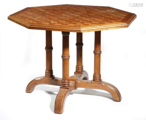 A late Victorian walnut octagonal centre table by …