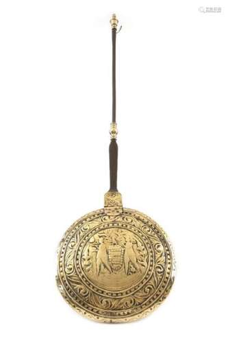 A 17th century Dutch brass warming pan, with an ir…