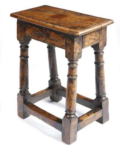 A rare mid 17th century yew joint stool, the seat …