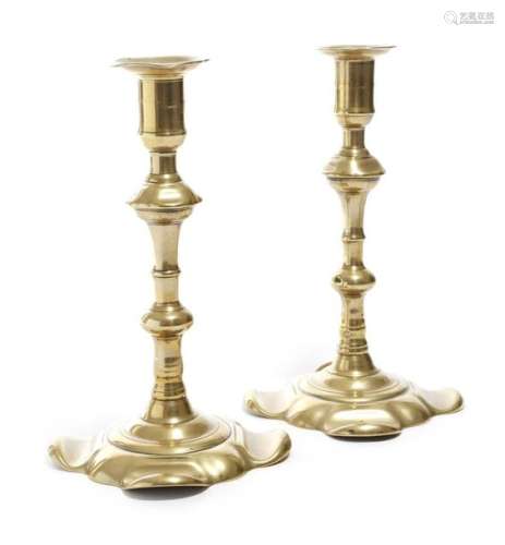 A pair of George II brass candlesticks by George G…