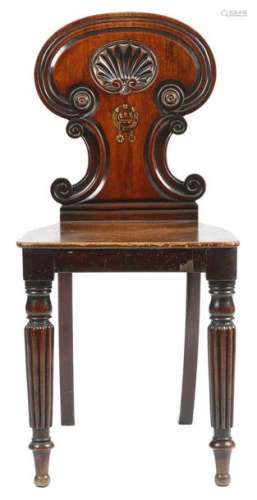 A George IV mahogany hall chair in the manner of G…