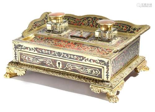 Λ A Napoleon III brass and tortoiseshell boulle ma…