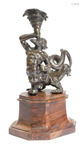An Italian bronze triton candlestick in the manner…